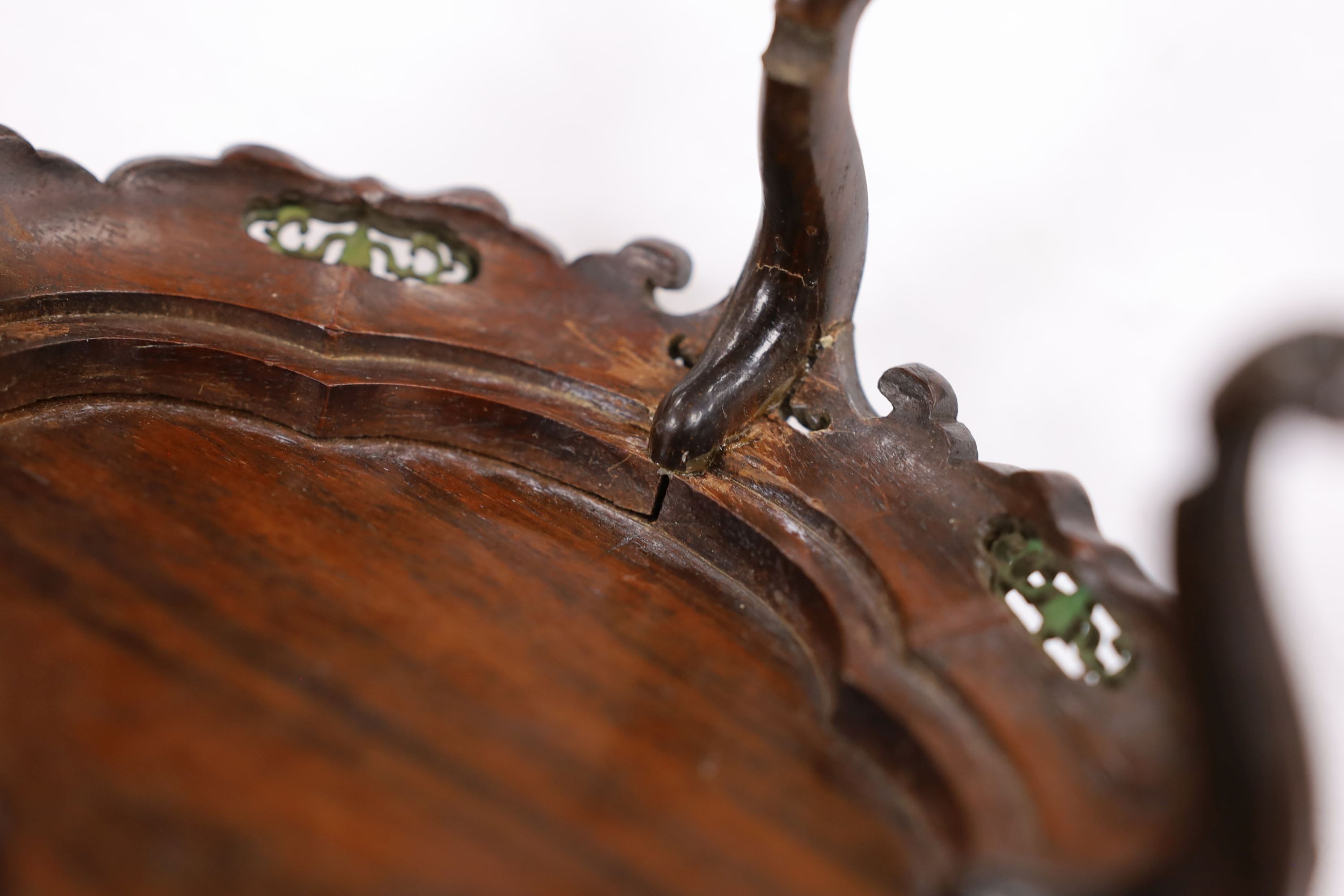 A fine Chinese oval hardwood and green stained Ivory inset stand, Qing dynasty, lacking stretcher, 15 cms wide.